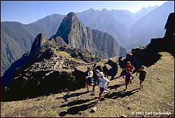 Runners above Machu Picchu